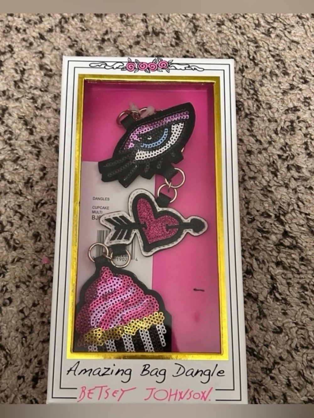 Betsey Johnson NWT bag dangle is a "Cupcake Multi" keychain set